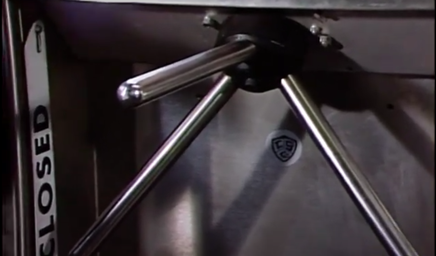 Screenshot from a video showing interviews with a transit worker and subway riders, with views of crowded stations and train lines.